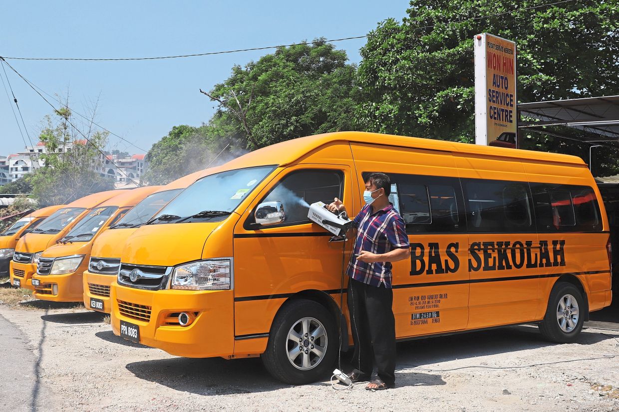 M'sian bus driver sanitising his vehicle
