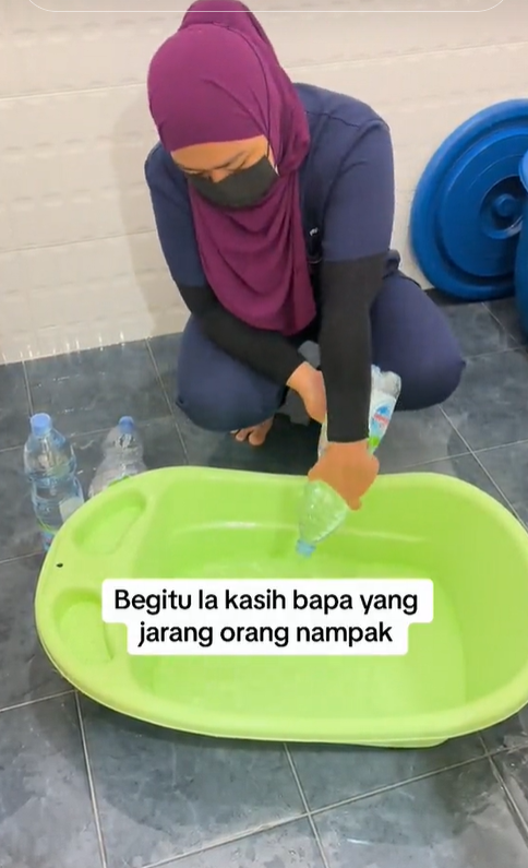 M'sian father buys mineral water for son's bathwater due to unclean water in terengganu