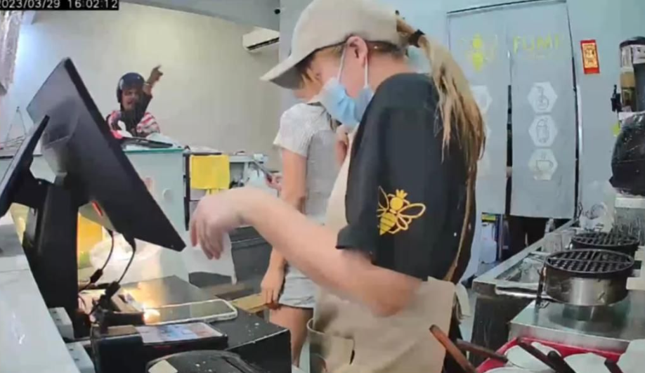 Shocking cctv clip shows foodpanda rider throw drink at female worker at penang restaurant