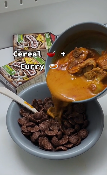 'better than milk' — sg content creator shocks netizens by mixing cereal with chicken curry
