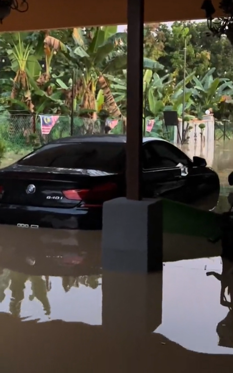 Man's bmw 6 series caught in floodwater in bangi