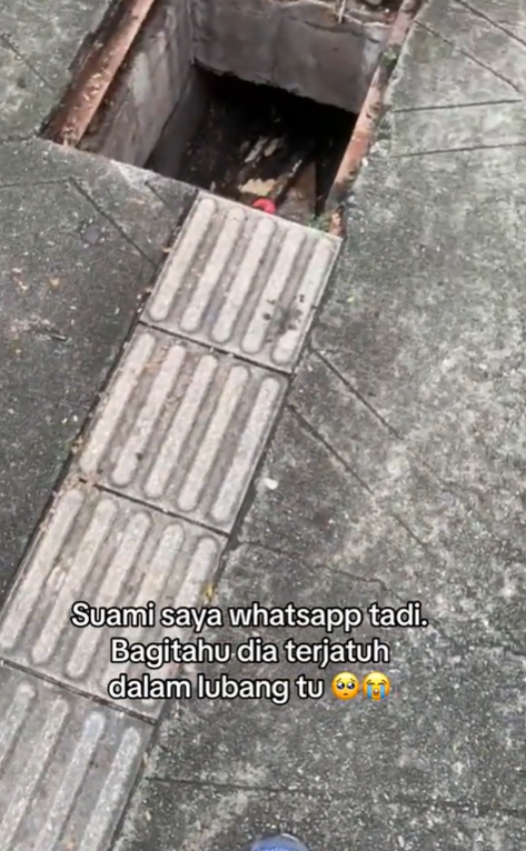 Giant hole along tactile walkway in kl
