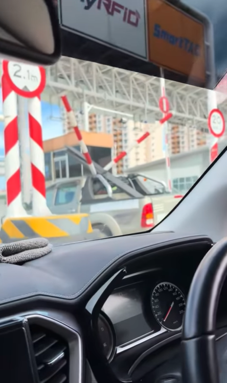 Hilux breaks height barrier into half at rfid toll booth