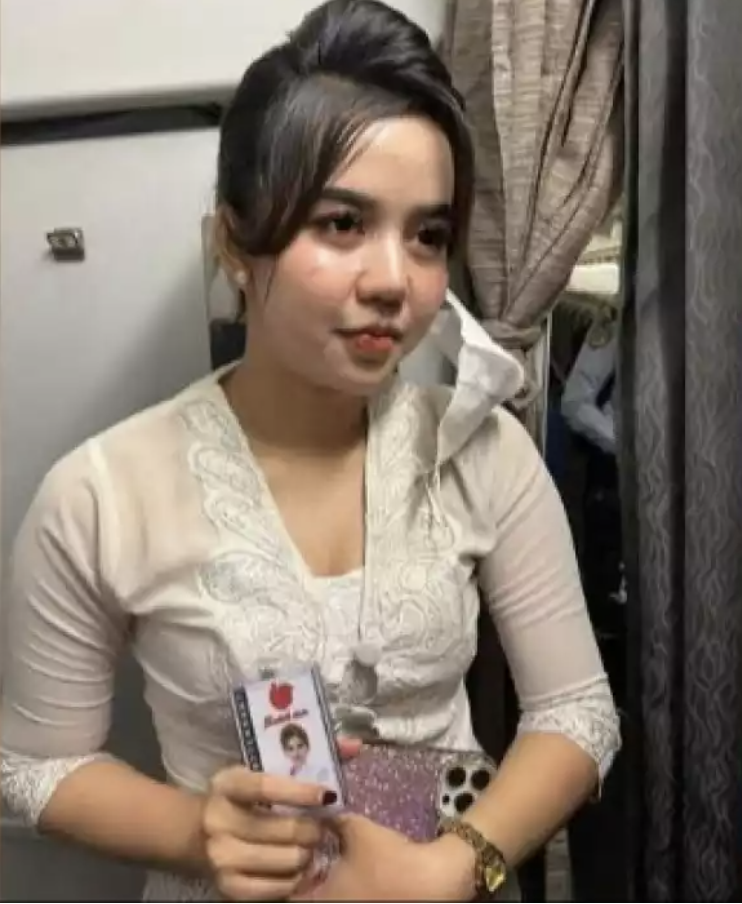 khairun nisa - flight attendant impersonator