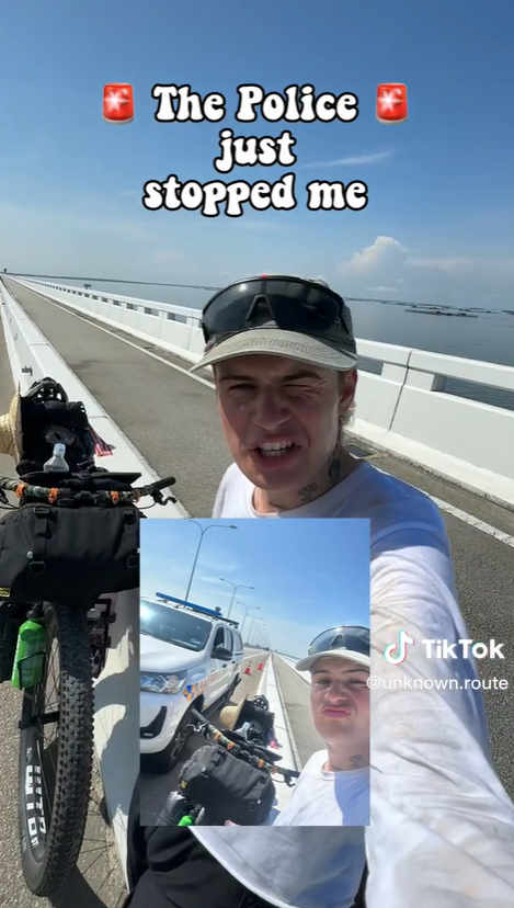 German cyclist fails to cycle across penang bridge after police stop him from doing so