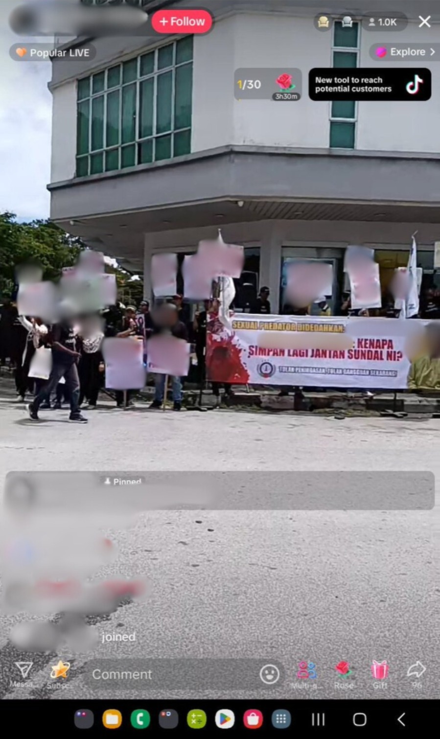 Screenshot of a protest at a local bank