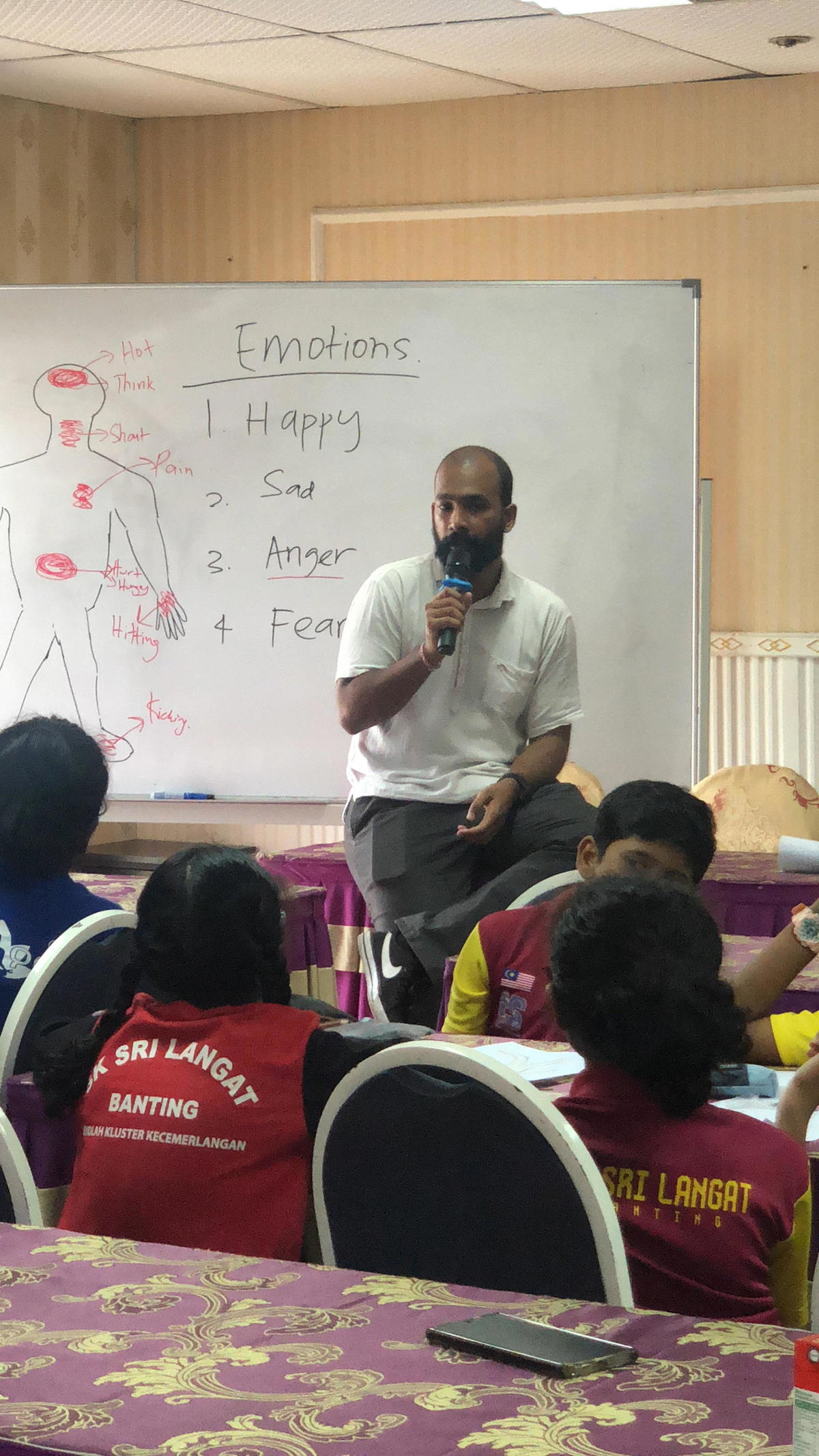 Seelan conducting mental health talk