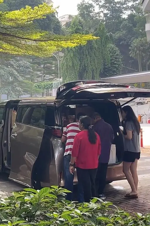 Selling strawberry from luxury car