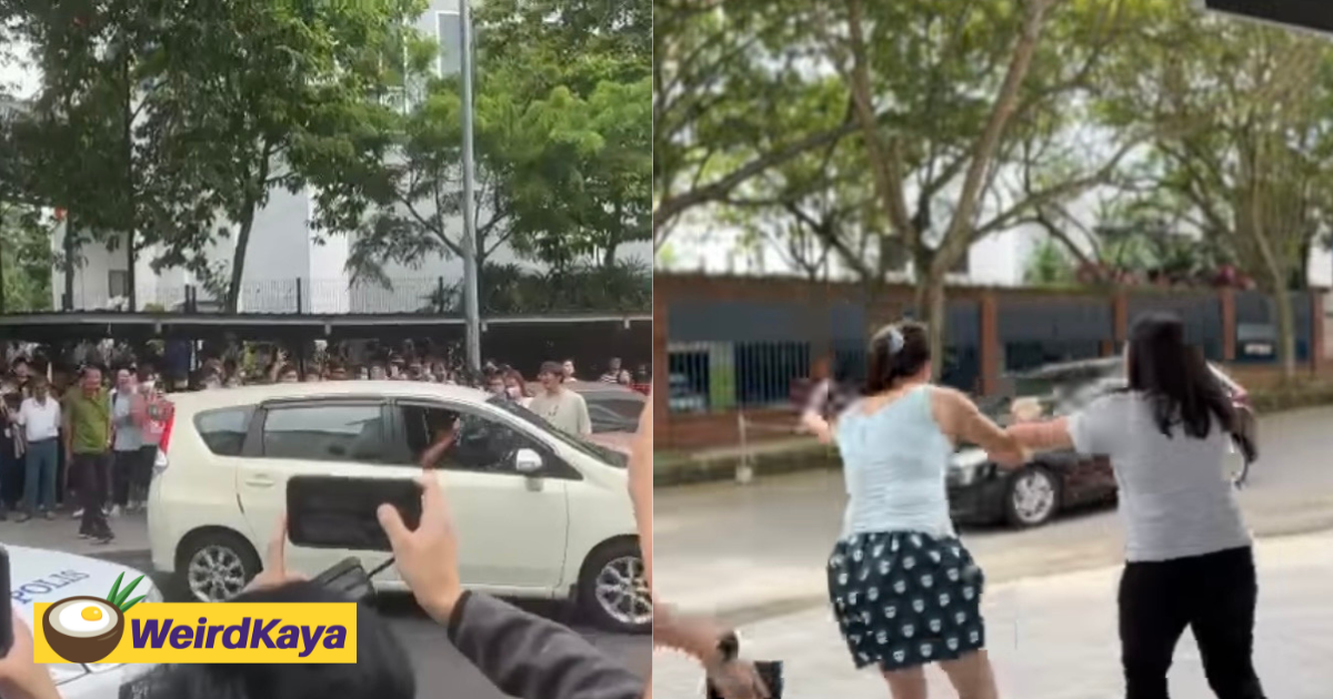 M’sian woman who parked illegally outside utar sg long allegedly throws phone at student & money at police | weirdkaya