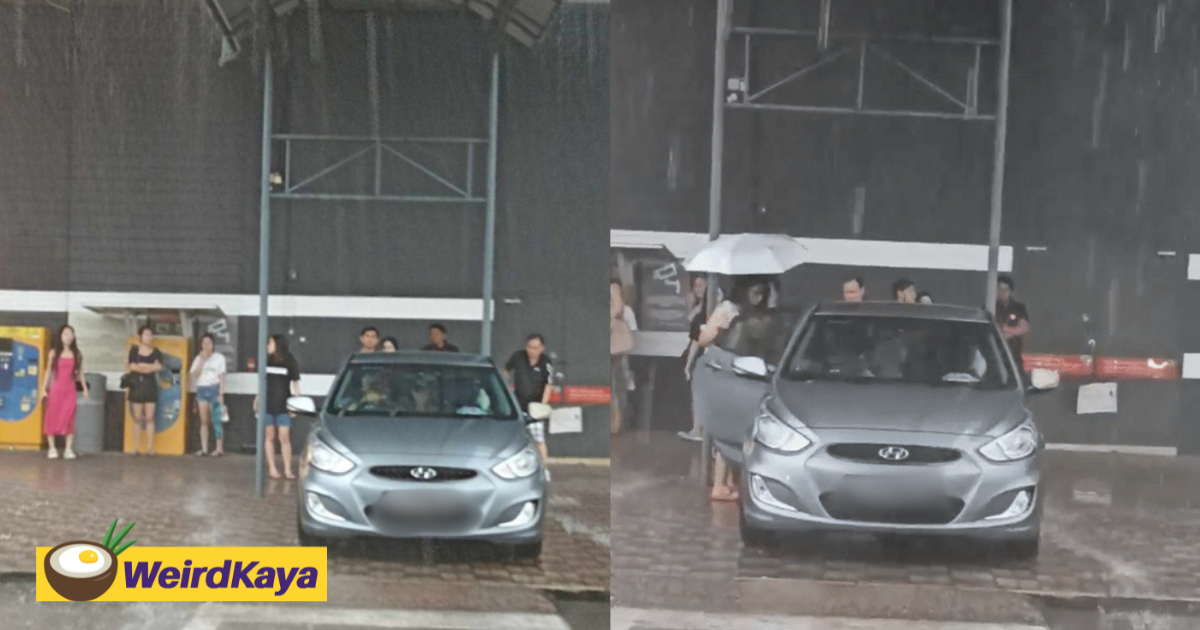 Sg-registered car blocks pavement at jb mall, forces m'sian shoppers to walk in heavy rain | weirdkaya