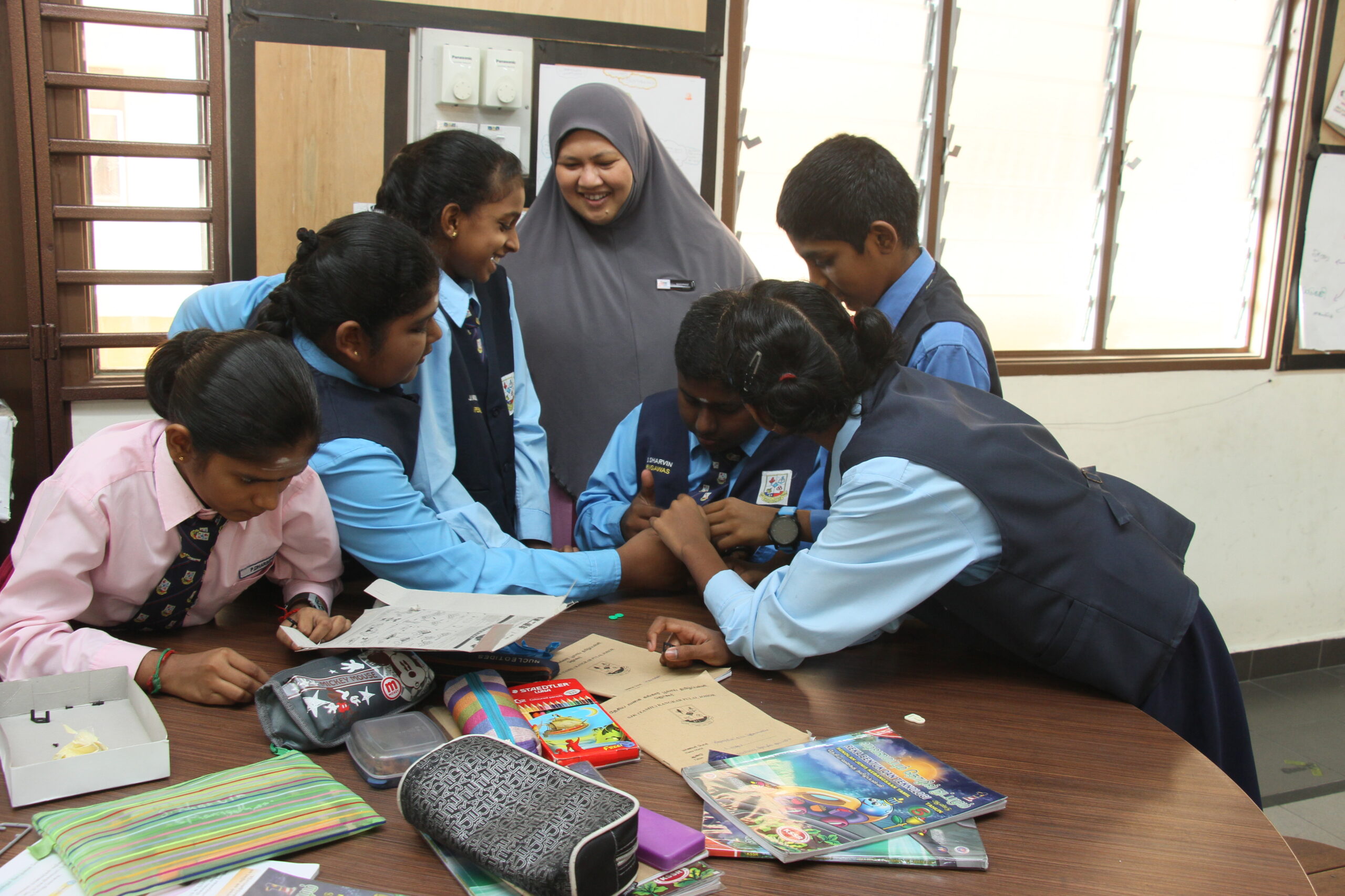 Shahnaz with the primary school students