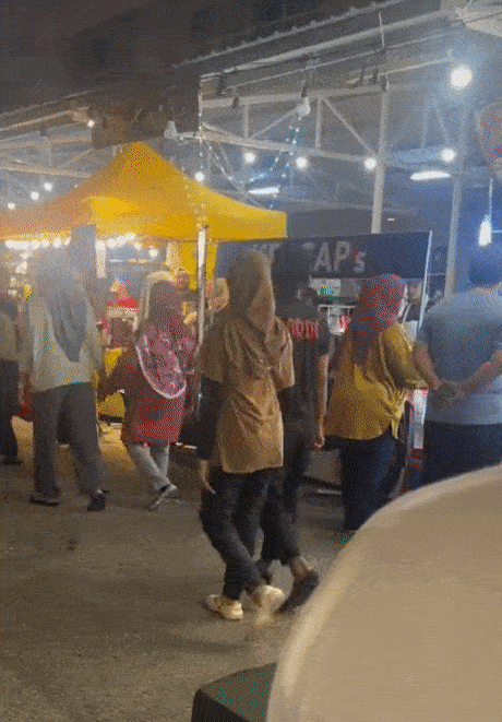 M'sian woman shows 'signal for help' at pj fair, police save her from bf who was allegedly abusive