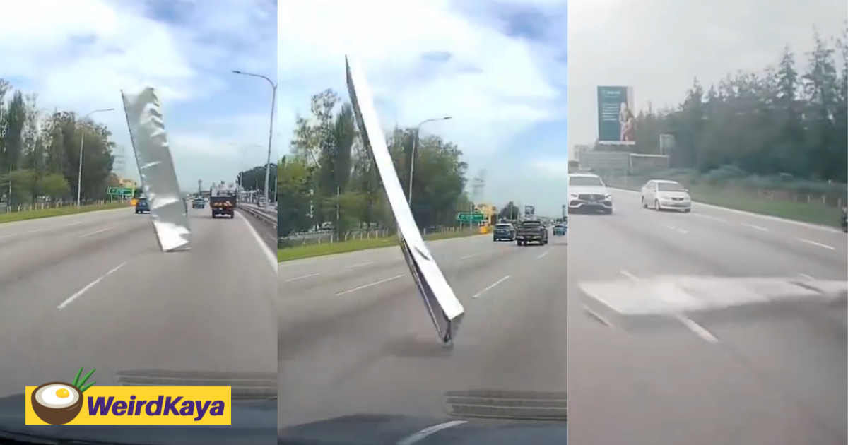 Signboard flies off lorry along highway, narrowly hits car behind | weirdkaya