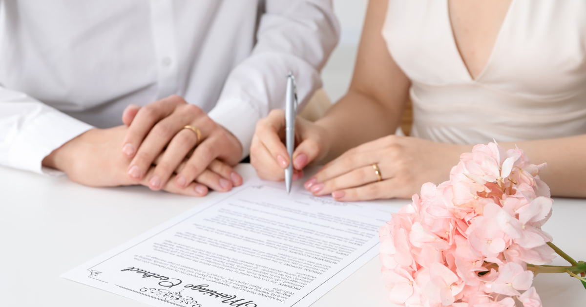 signing marriage certificate