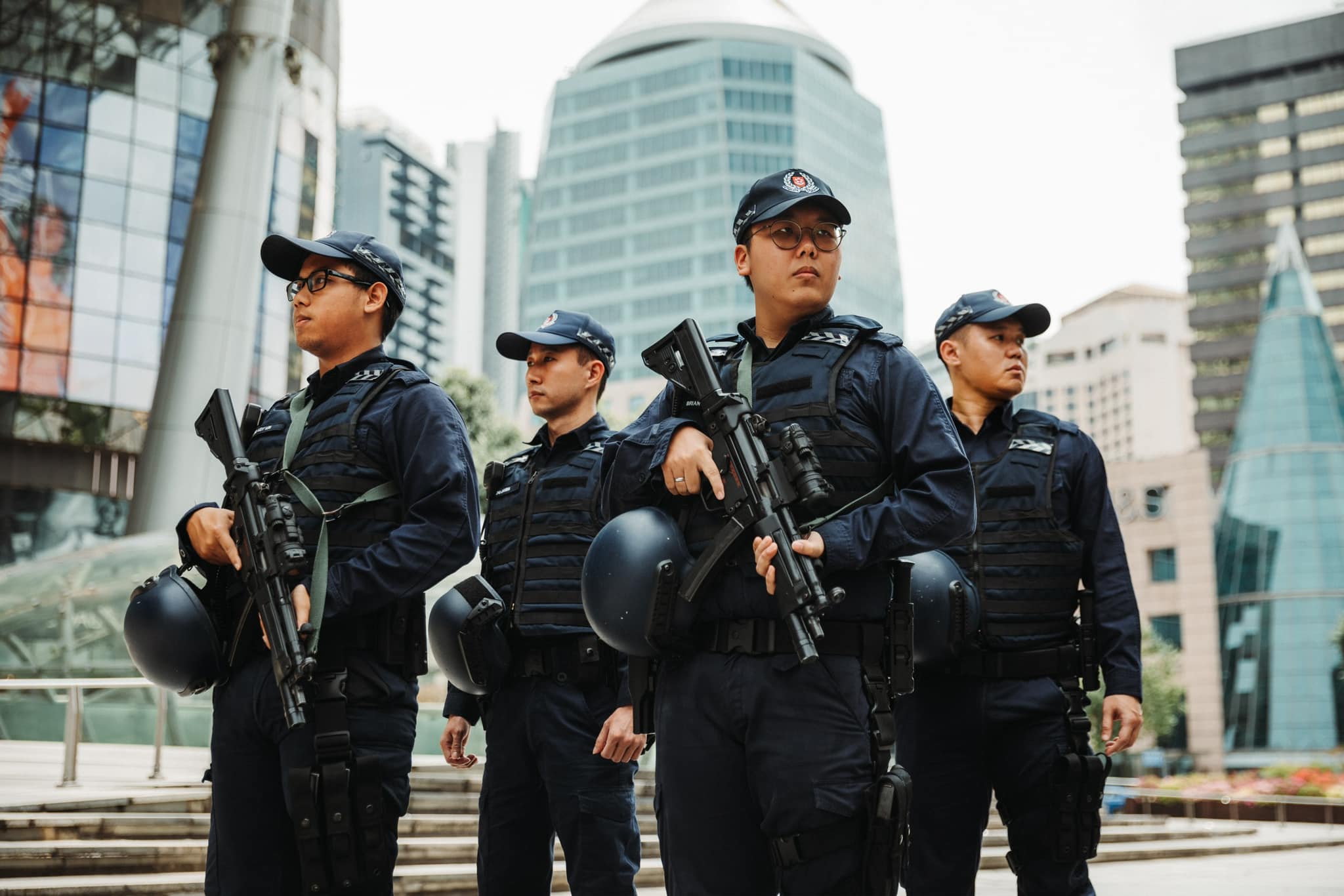 Officers from the singapore police force (spf)