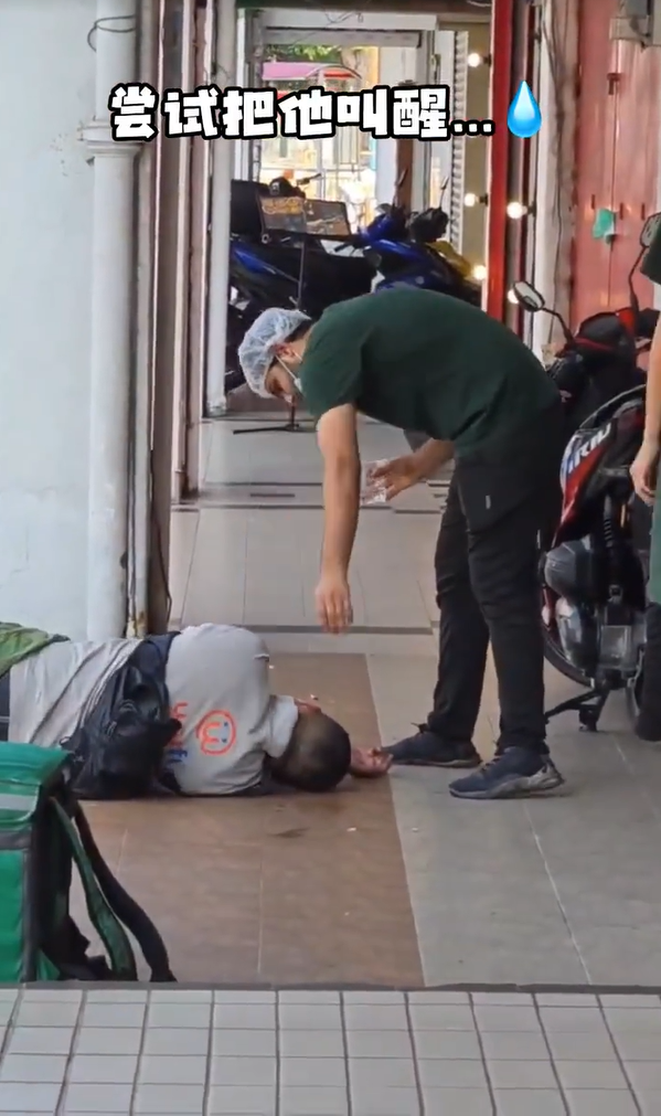 Man tries waking delivery rider up