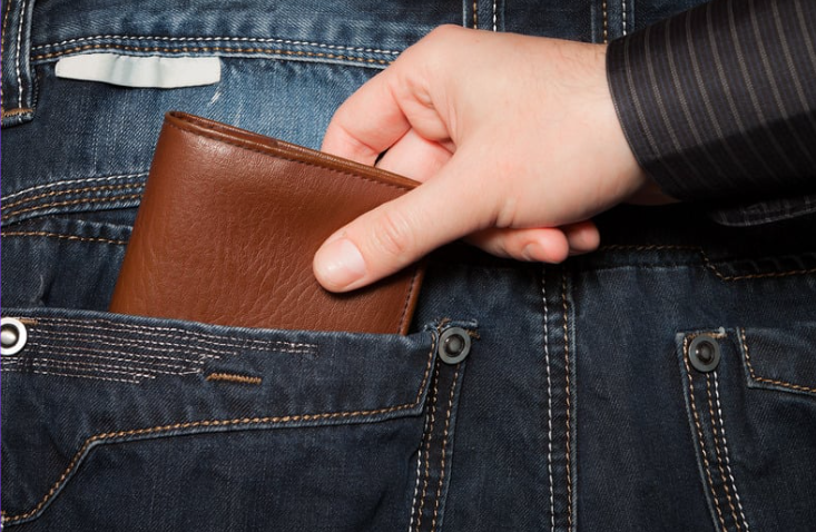 Stealing wallet from person's pocket