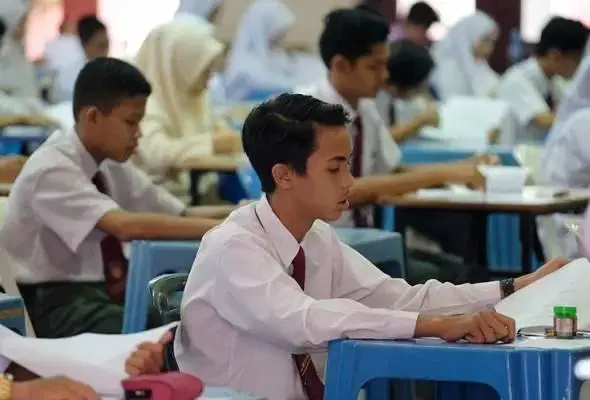 student in malaysia sitting. for exam