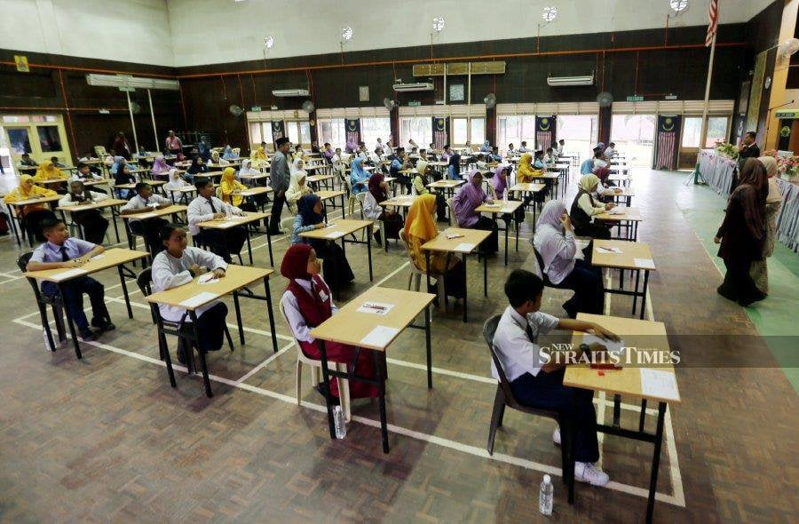 Students sitting for PT3