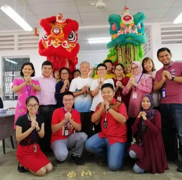 Suzana celebrating cny with colleagues