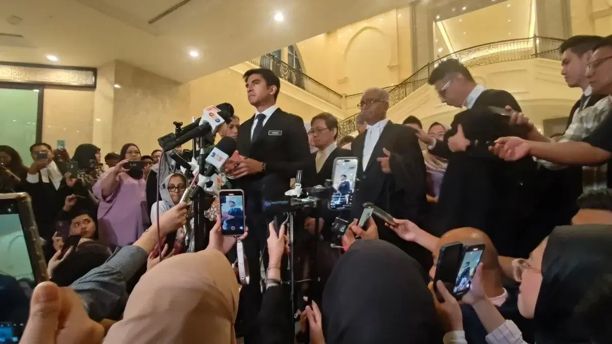 Syed Saddiq talking to press