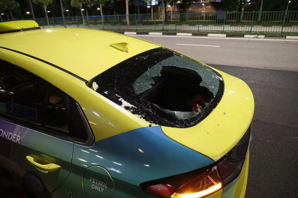 Taxi's damaged rear windshield