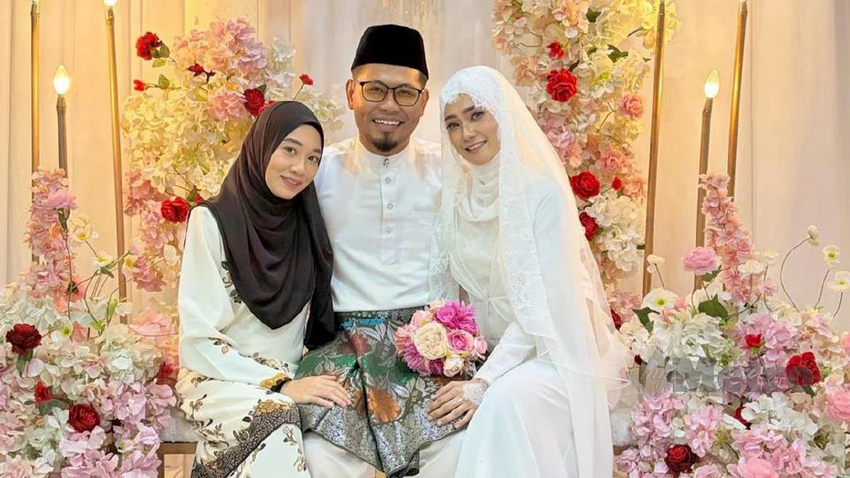 T'gganu with his 2 wives at wedding