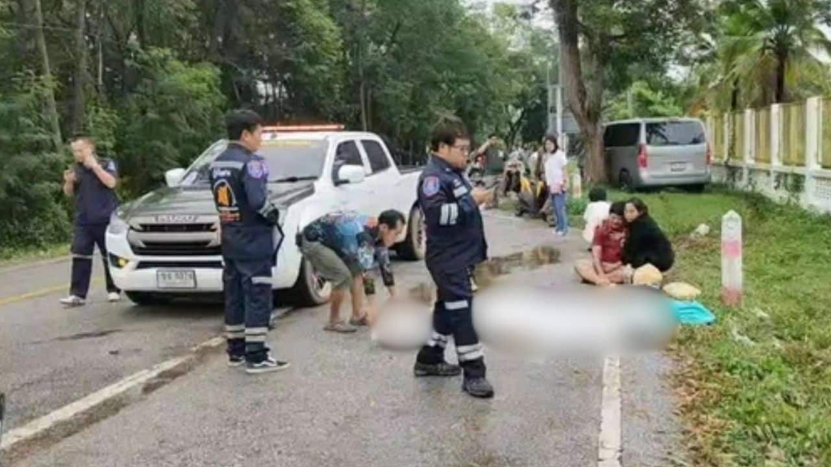 Thai man crying over body of mother