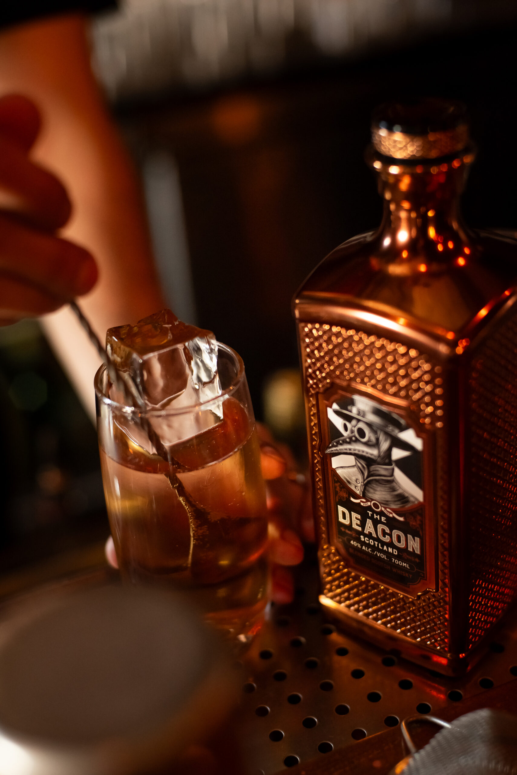 The deacon launch at skullduggery mixing drink