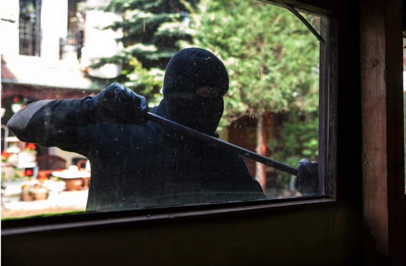 Thief breaking in