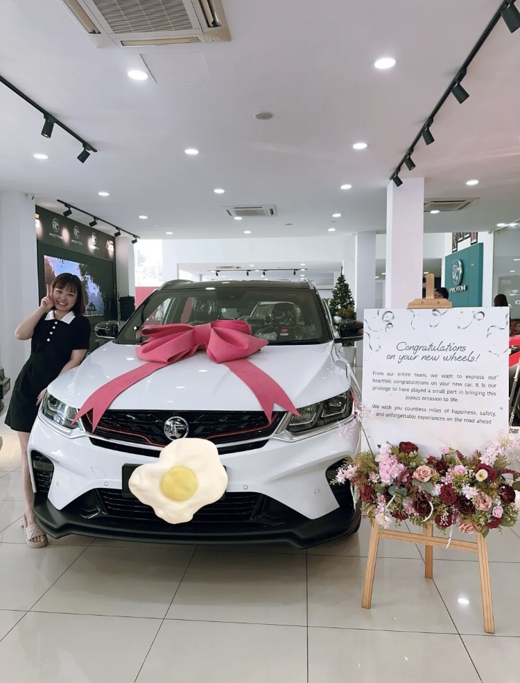 M'sian woman poses with proton x50