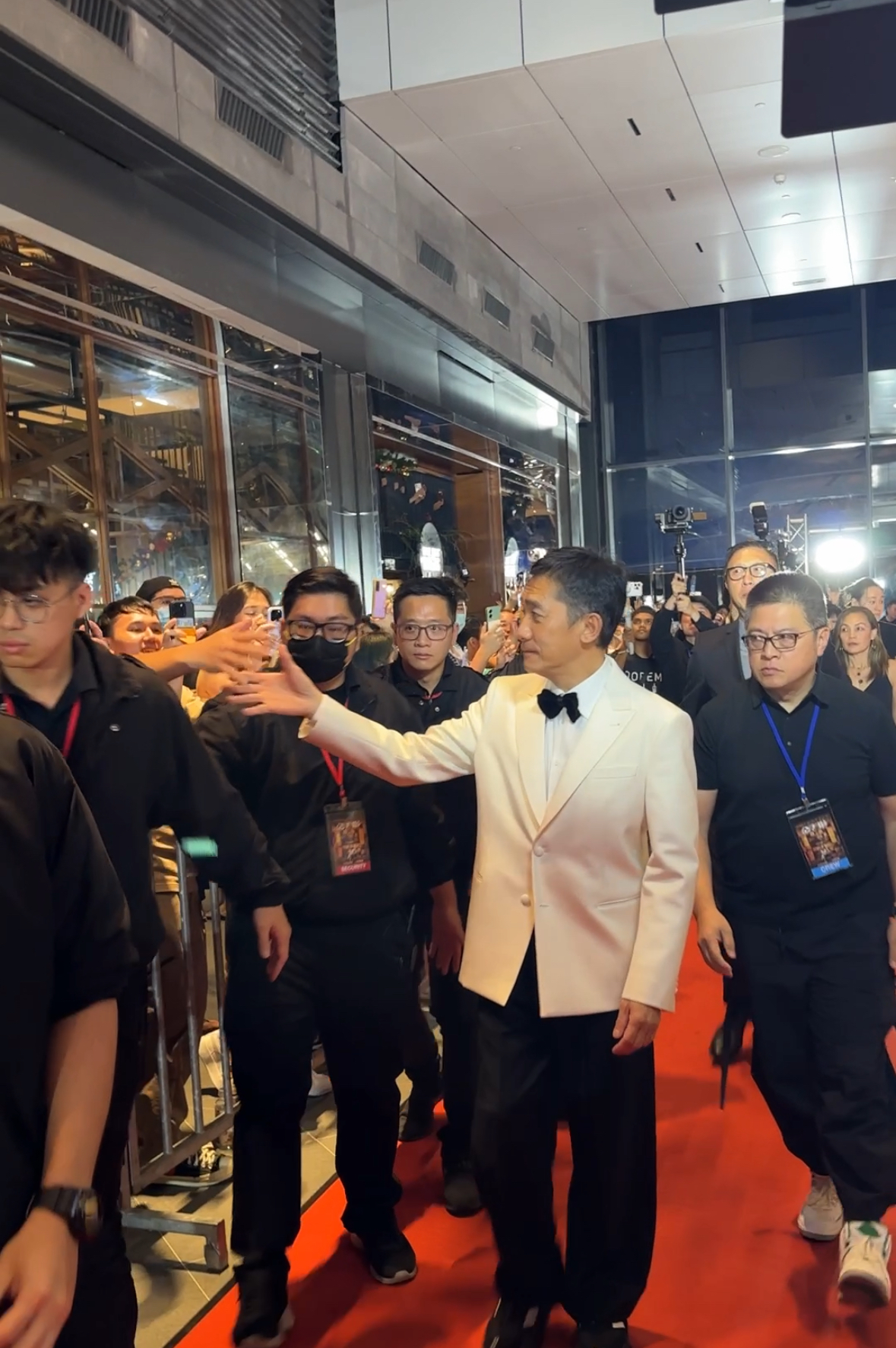 Tony leung on red carpet for gala premiere