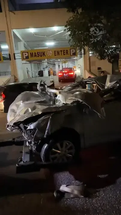 Toyota Camry crushed by fall