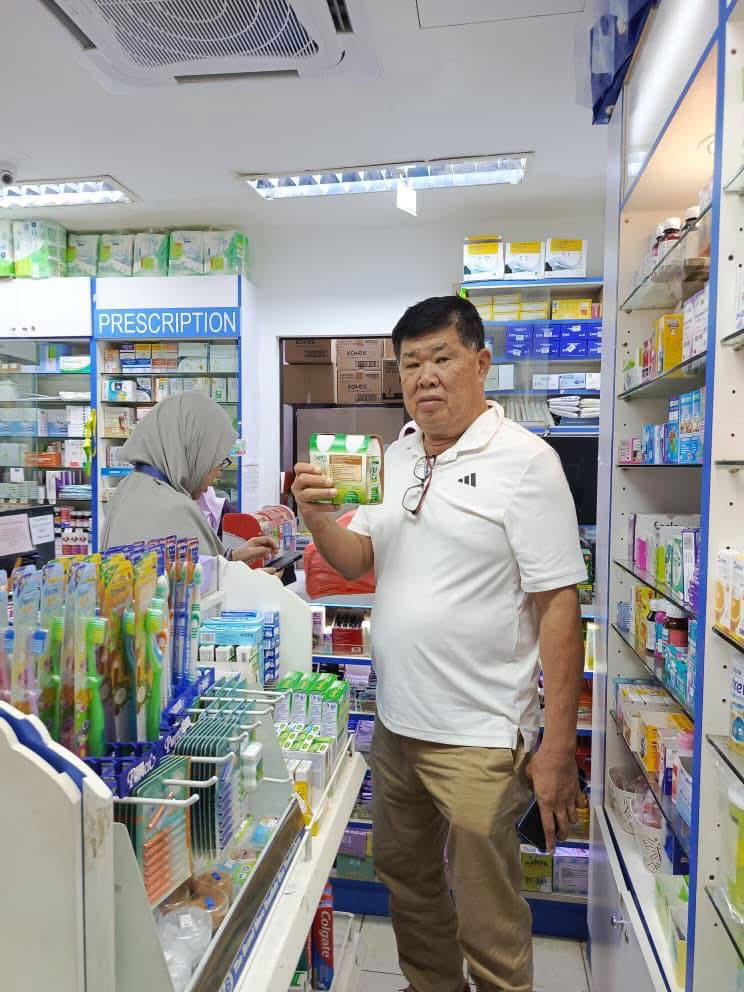 uncle kentang buying milk powder at pharmacy