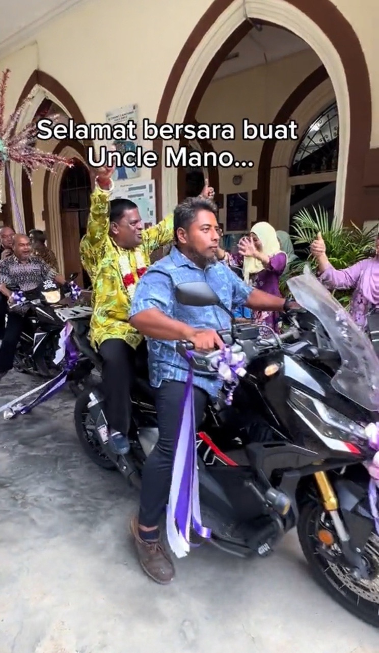 Uncle mano riding motor with a teacher at his farewell