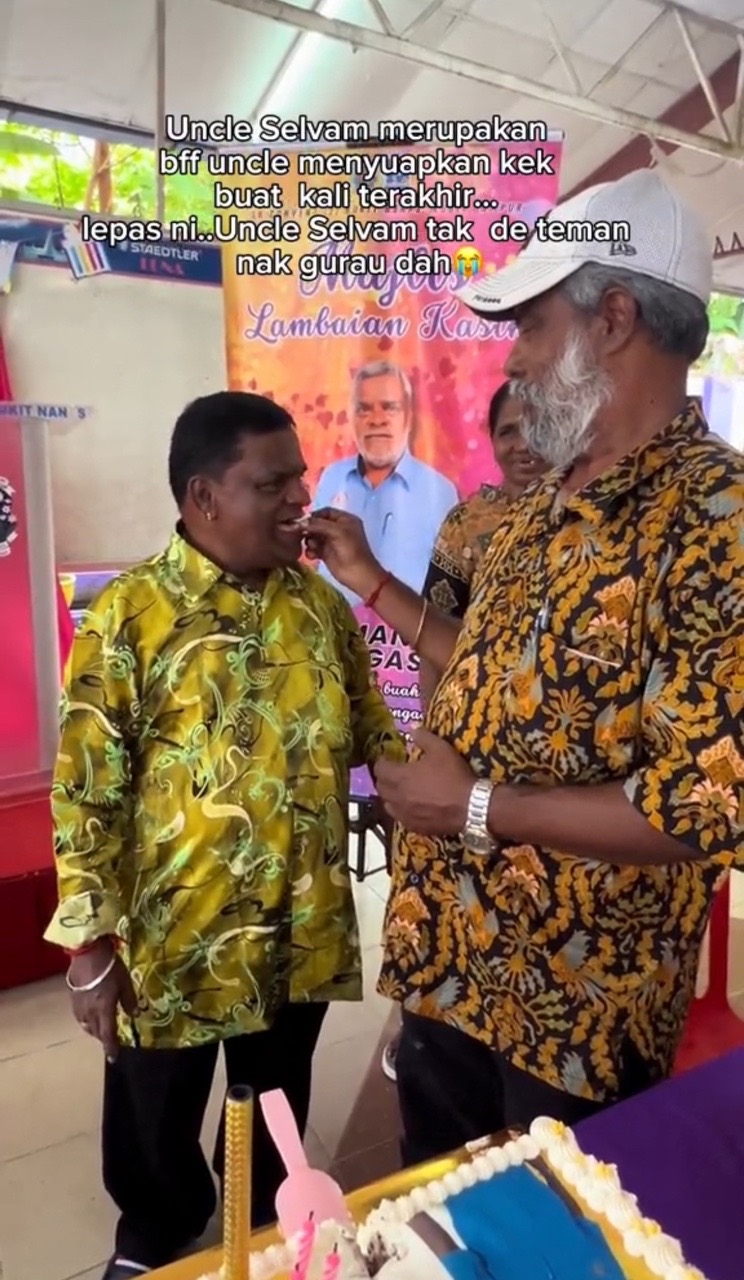 Uncle selvam feeding cake to uncle mano at his farewell event