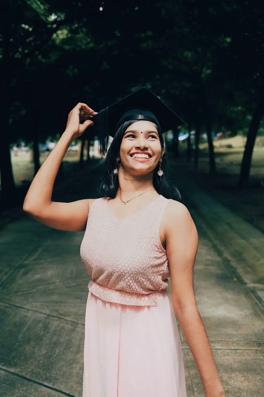 Nisshaa wearing a mortarboard