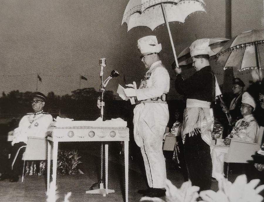The yang di-pertuan agong reading the proclamation of malaysia at stadium merdeka on september 16, 1963.
