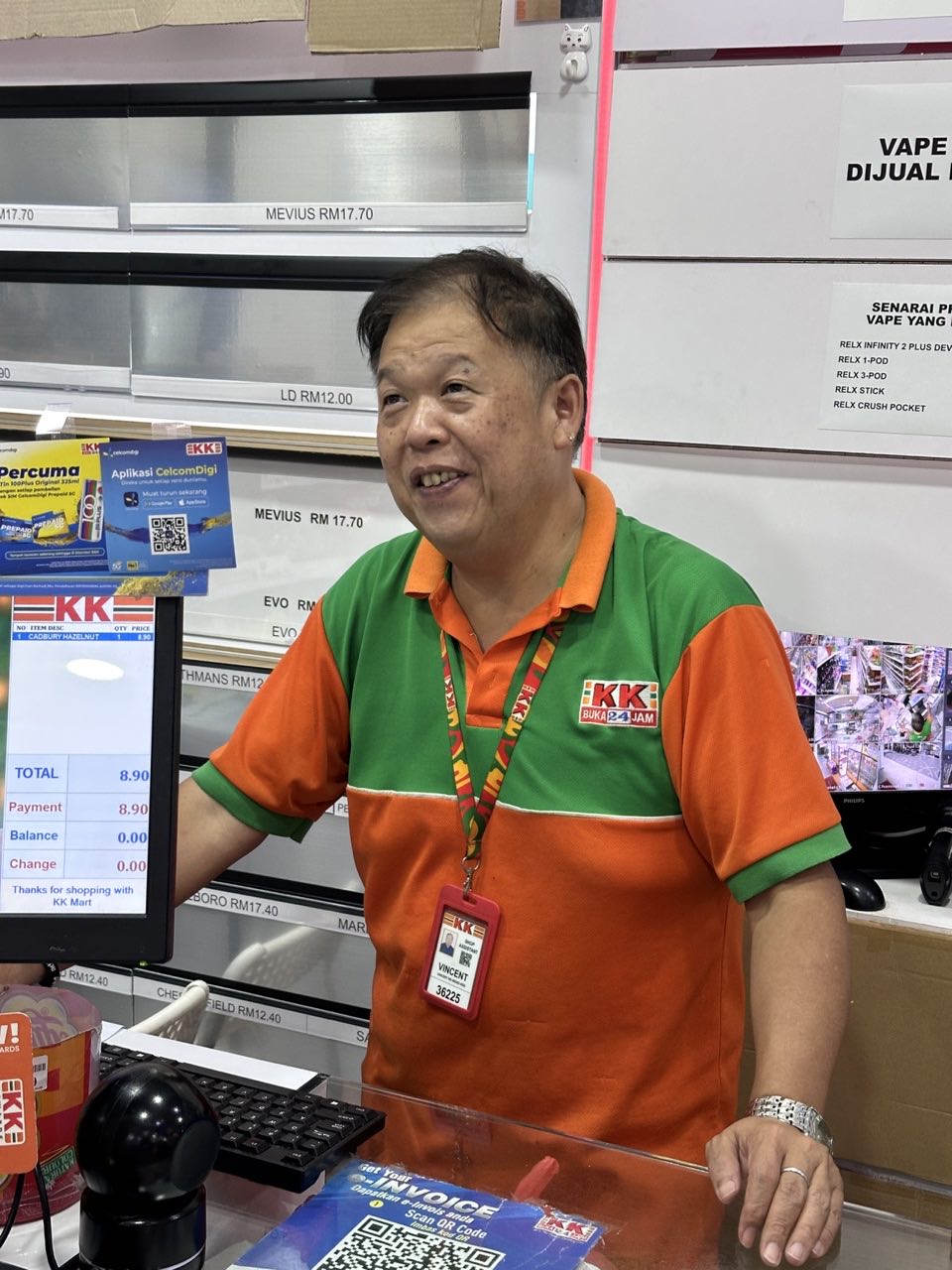 Vincent happy as the cashier