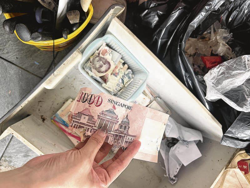 Volunteers find rm3k of cash chewed by rats $1000 note