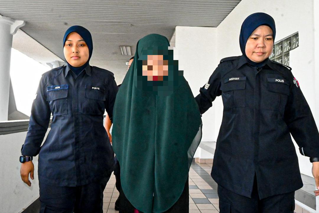 Malaysian mum detained by police