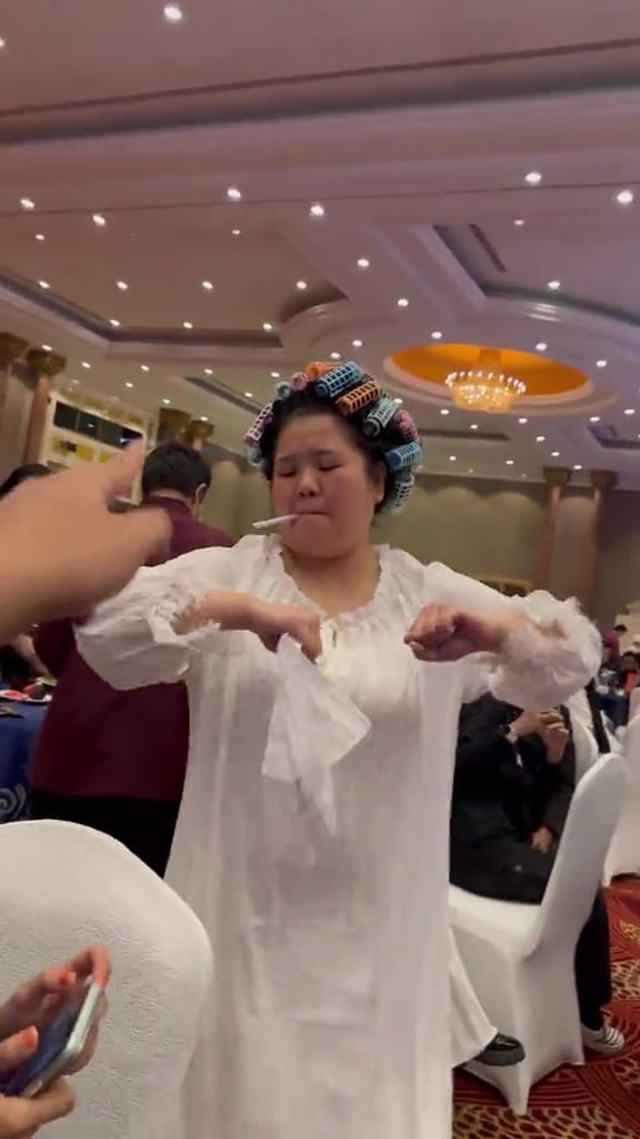Msian landlady qiu yuen cosplayer dancing in an event