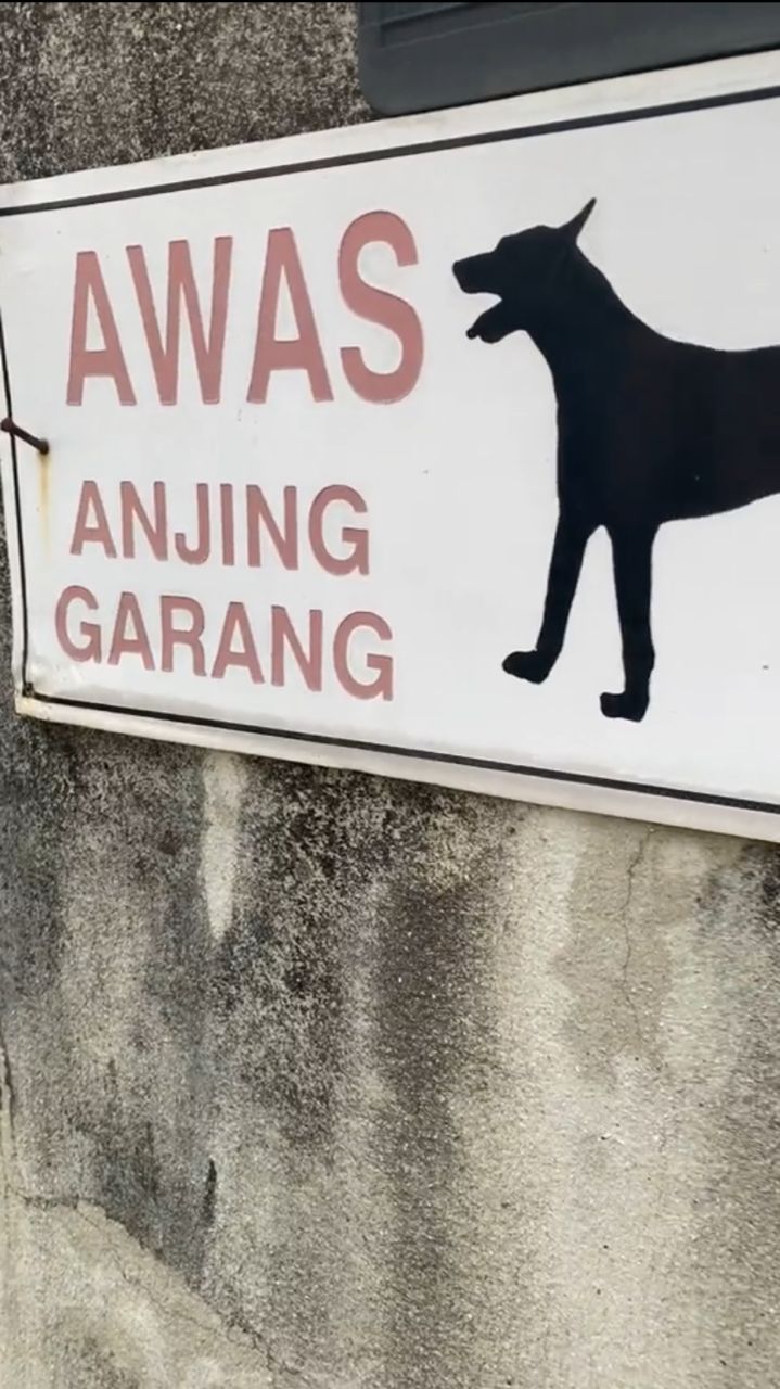 Beware of fierce dog sign