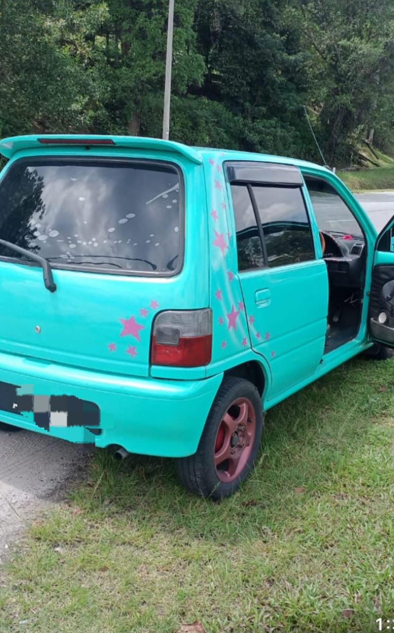 An old second hand kancil car used by msian parent