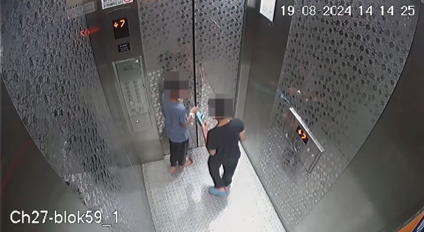 Lift footage shows slipper placed between door was what caused 2 m'sian boys to be stuck for 9 hours