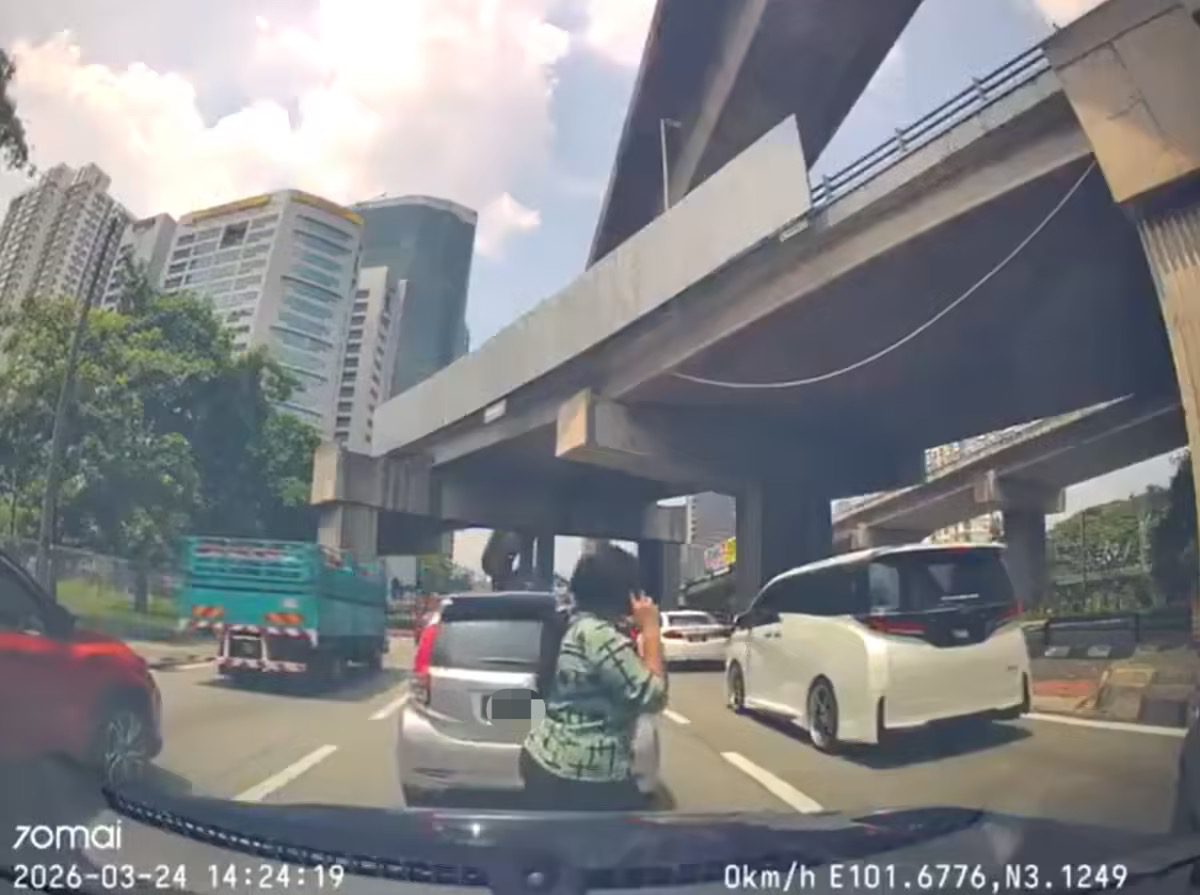 Woman distracted by phone accident (1)