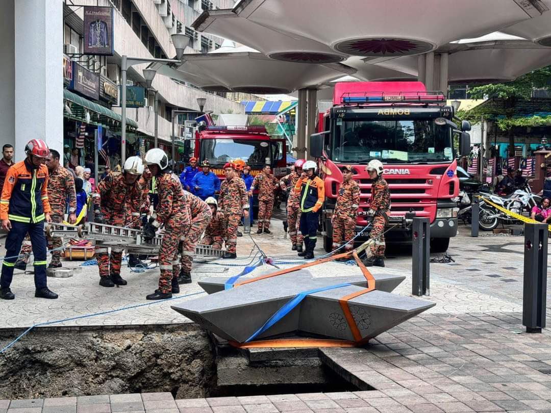 Woman falls into sinkhole in kl