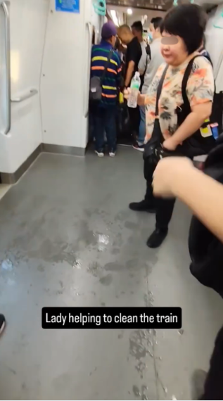 Woman spits water on S'pore MRT train (3)