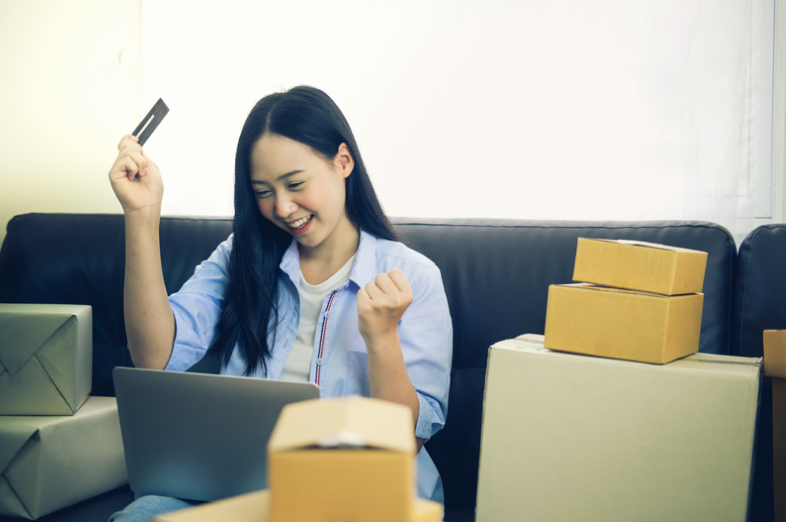 woman with cardboard boxes
