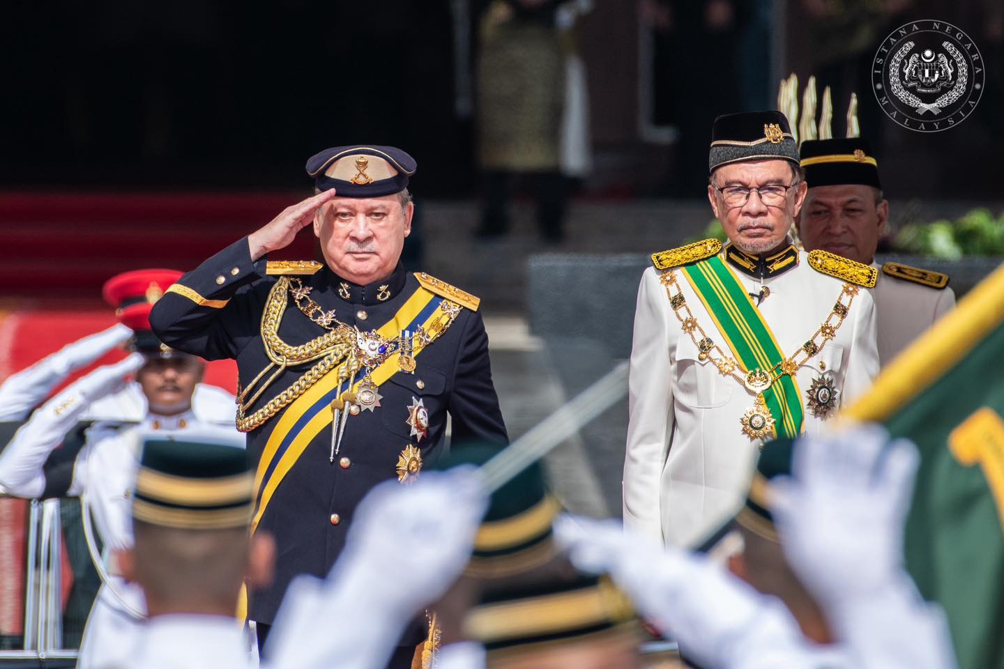 Yang di-pertuan agong sultan ibrahim sultan iskandar and pm anwar ibrahim at the coronation ceremony